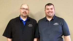 Fargo employees receiving certification (L-R): NOC Ethernet/IP technician II Steve Frank; wholesale sales manager Mark Aslakson.